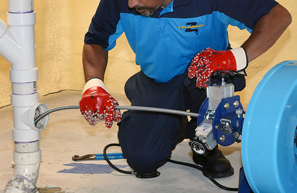 Z PLUMBERZ of Bergen servicing floor drain