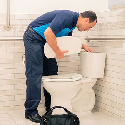 ZPZ Tech checking toilet top