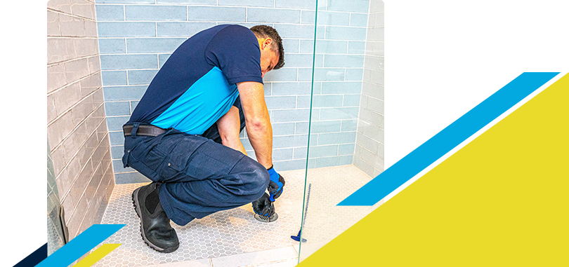 Z PLUMBERZ technician fixing shower drain