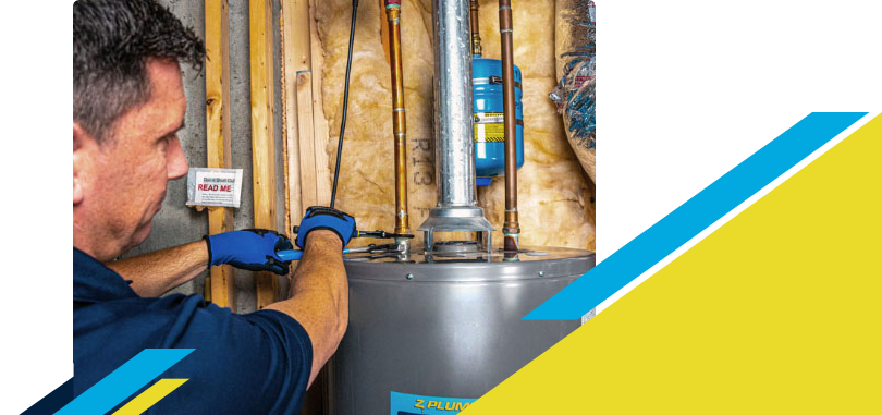 Z PLUMBERZ of Palm Beach technician fixing water heater